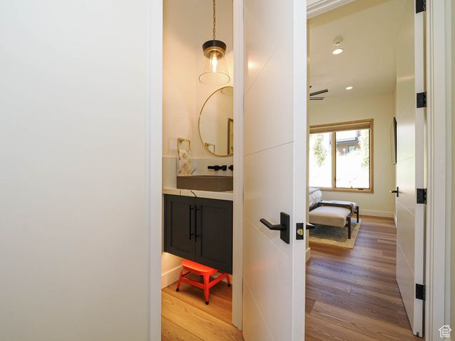 Hall featuring wood finished floors and recessed lighting | Image 64