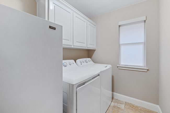 Laundry with space for second refrigerator. Lots of natural light. | Image 28