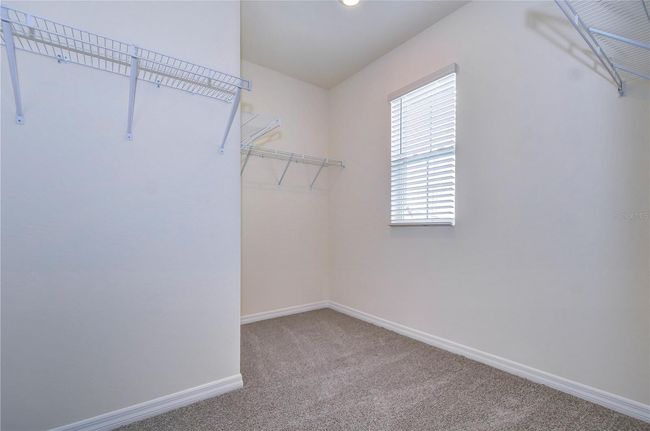 9176 Forge Breeze Loop, House other with 5 bedrooms, 3 bathrooms and null parking in WESLEY CHAPEL FL | Image 12