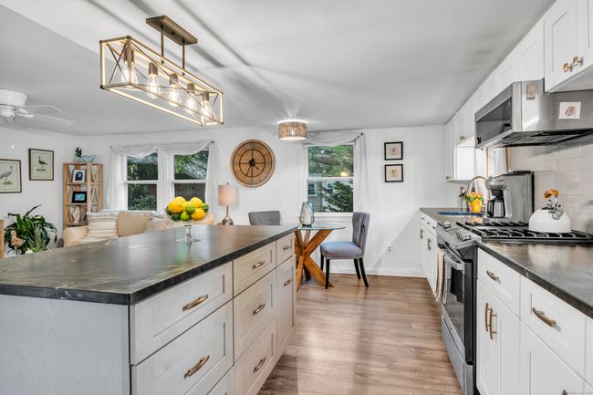 Large Island with Black Diamond Leatherette Quartzite Countertops | Image 4