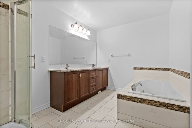 182 Meandering Brook Dr, House attached with 4 bedrooms, 4 bathrooms and 2 parking in Gloucester ON | Image 26