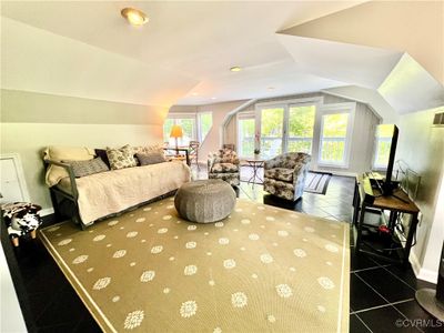 Living Room featuring lofted ceiling and tile patterned floors | Image 3