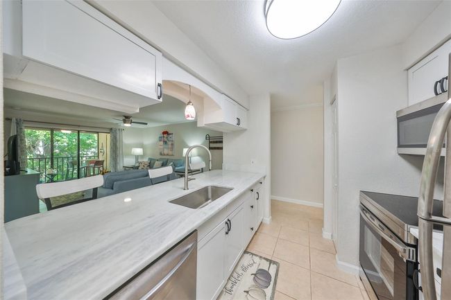 APT-203 - 10100 Sailwinds Blvd N, Condo with 3 bedrooms, 2 bathrooms and null parking in LARGO FL | Image 7