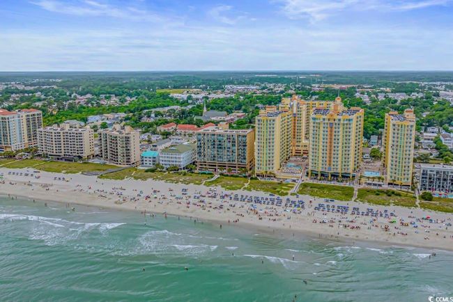 Bird's eye view with a view of the beach and a water view | Image 36
