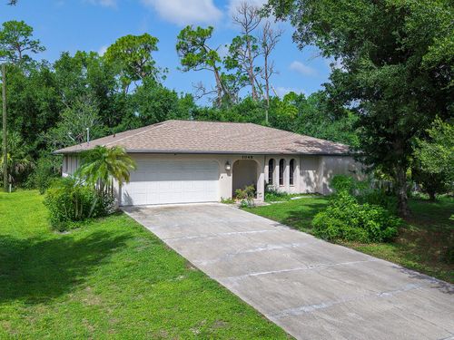 1049 Fleetwood Dr, PORT CHARLOTTE, FL, 33948-3650 | Card Image