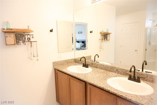 Full bathroom with double vanity and a sink | Image 19