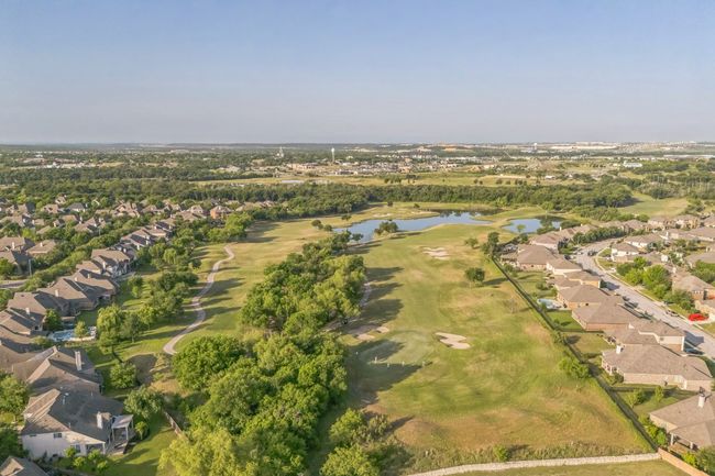 Birds eye view of property featuring golf course view, a residential view, and a water view | Image 38