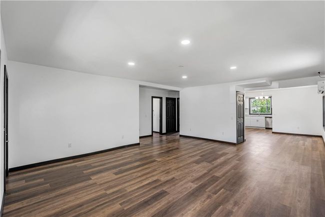 Living room featuring recessed lighting, dark wood finished floors, and baseboards | Image 14