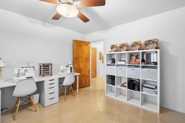 Office featuring ceiling fan and light floors | Image 34