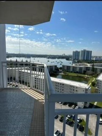 Balcony overlooking marina and city view | Image 1