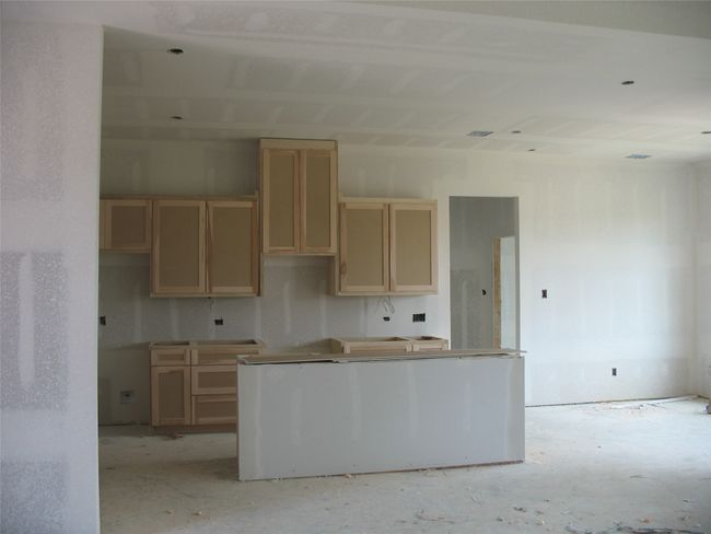Kitchen with light brown cabinets | Image 7