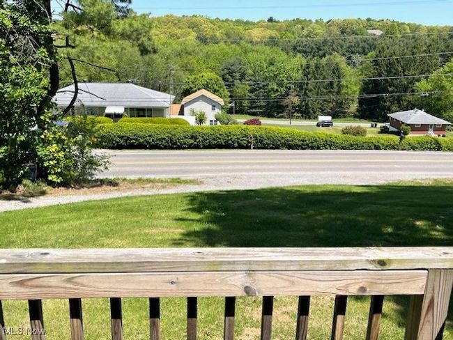 Front view from doorway showing Deck railing and Calcutta Smith Ferry Rd. | Image 22