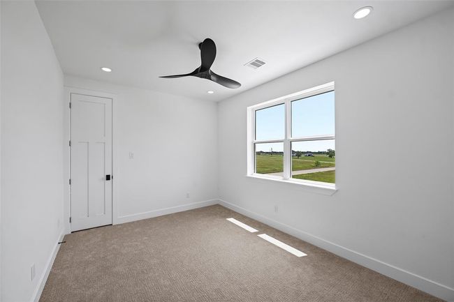 Spacious upstairs 4th bedroom with ample natural light. | Image 33