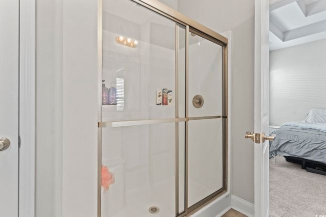 Full bath featuring baseboards, ensuite bathroom, and a shower stall | Image 25