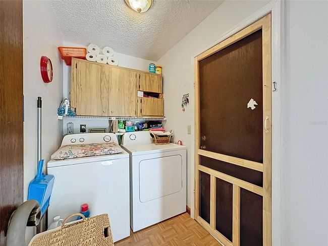 linside laundry room as you enter the home from the 2 car garage | Image 45