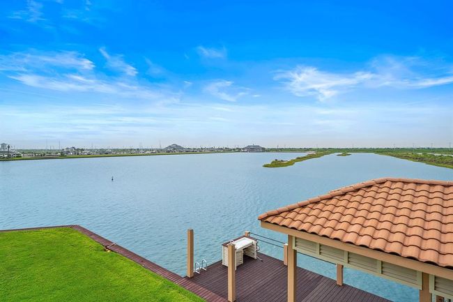 Incredible water views surround the home, offering stunning vistas from every corner | Image 21