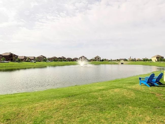 Water view with nearby suburban area | Image 25