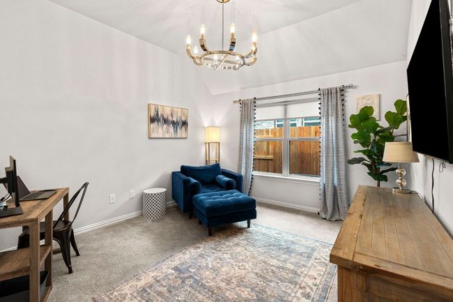 Open flex space with gorgeous chandelier. Perfect for an office, playroom, etc. | Image 16