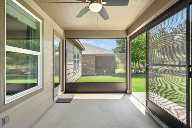 Garage with overhead hanging rack storage | Image 23