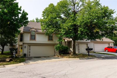 View of front of property with a garage | Image 1