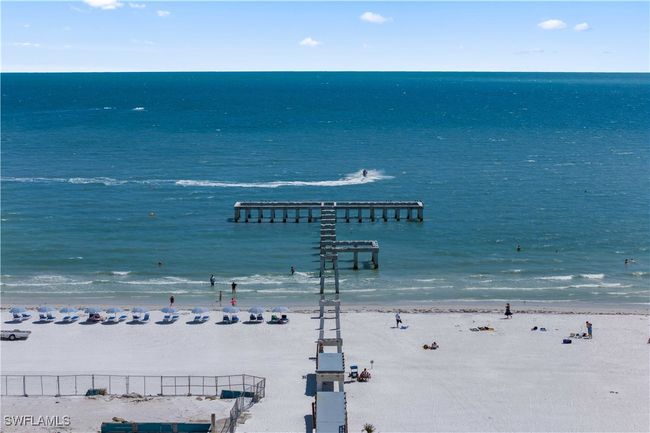 Fort Myers Beach Pier is a beloved landmark extending gracefully into the sparkling Gulf waters. | Image 36