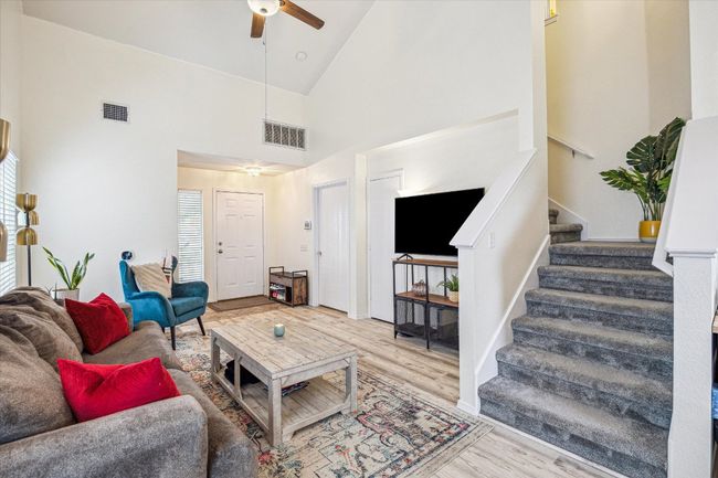 Living area with vaulted ceilings | Image 4