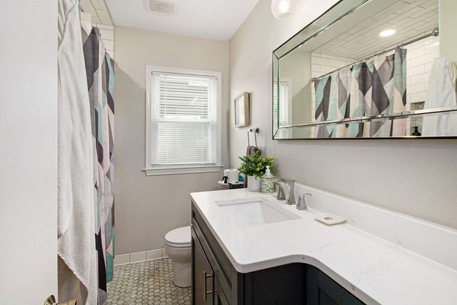 Updated Full Bathroom with tub/shower | Image 19