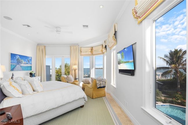 Primary Bedroom is on main living levell (2nd Floor) had remote controlled window treatments & gorgeous Bay views | Image 26
