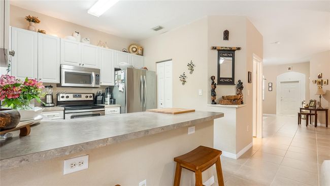 12752 Sw 49 Th Ct, Townhouse with 4 bedrooms, 3 bathrooms and null parking in Miramar FL | Image 12