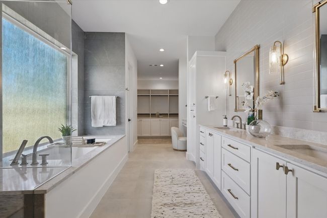 Full bath featuring double vanity, recessed lighting, a sink, and a healthy amount of sunlight | Image 18