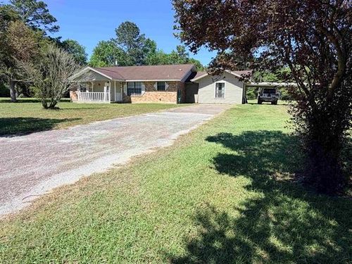 8957 Tejas Ln, Silsbee, TX, 77656-8119 | Card Image