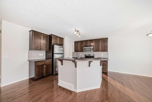 17 Sage Hill Court Nw, Home with 5 bedrooms, 3 bathrooms and 2 parking in Calgary AB | Image 6