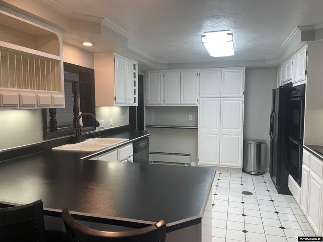 405 Harshman St, House other with 4 bedrooms, 1 bathrooms and null parking in Rawlins WY | Image 11