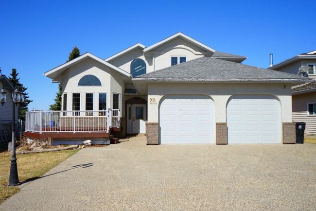 911 Birch Street, Home with 5 bedrooms, 3 bathrooms and 4 parking in Beaverlodge AB | Image 1