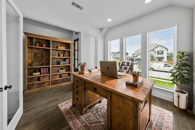 Home office with dark wood-style flooring, recessed lighting, and vaulted ceiling | Image 6