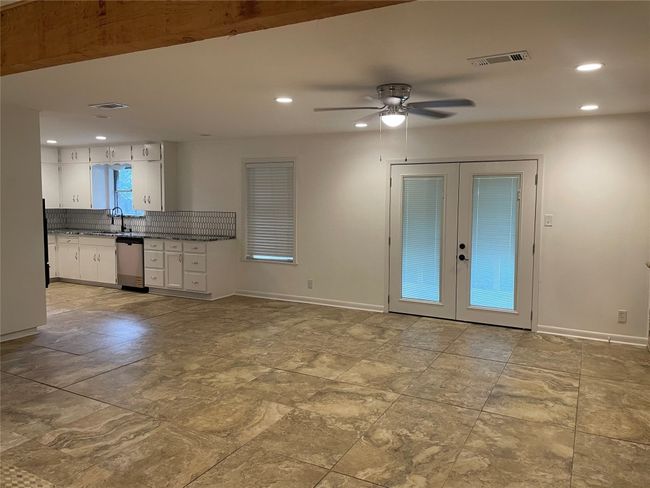 Open area to family/living room | Image 8