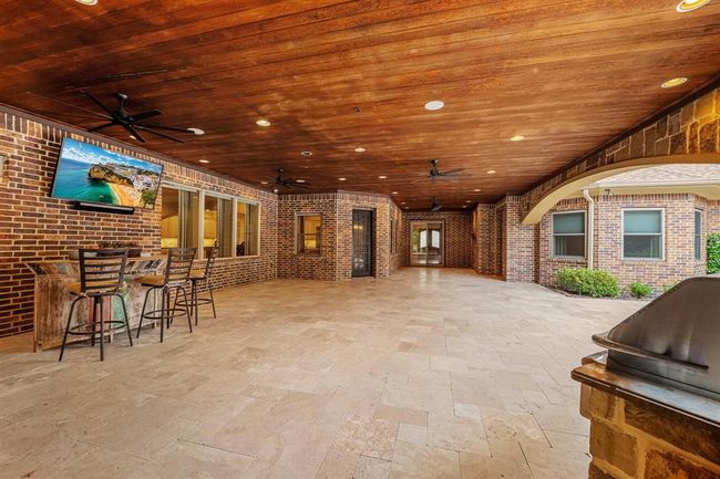 Extra-large covered patio. | Image 16