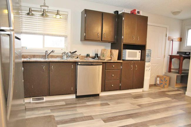 104 4 Th St E, House other with 4 bedrooms, 2 bathrooms and 2 parking in Lashburn SK | Image 6