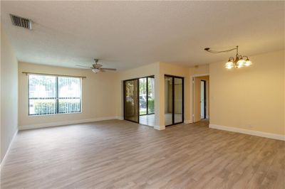 OPEN LIVING ROOM WITH LAMINATE FLOORS | Image 3