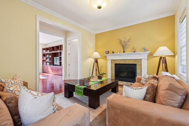 Formal Living Room with Gas Fireplace and Designer Colors | Image 4