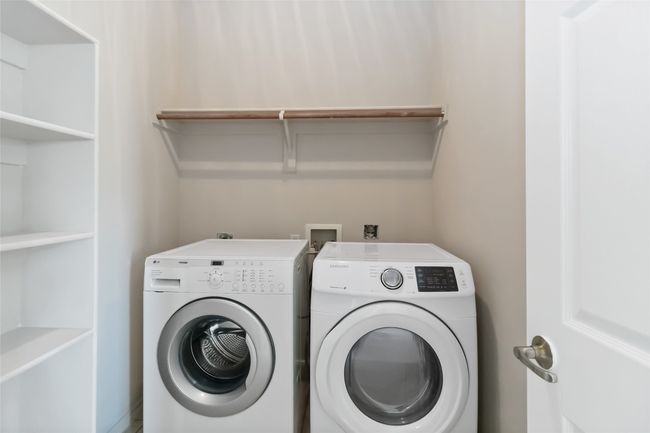 Laundry area with laundry area and separate washer and dryer | Image 7