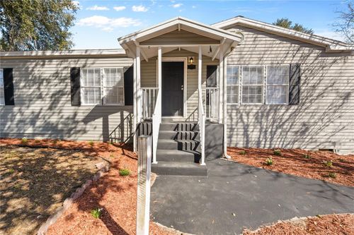 27846 W Pelican Isle Dr, Leesburg, FL, 34748-9300 | Card Image