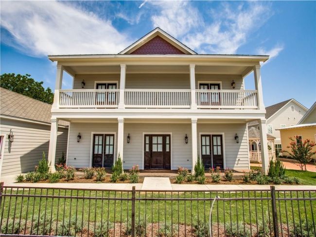 View of the two-story duplex (occupied) facing Cedar Street. | Image 11