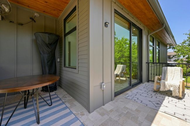 Upstairs patio area. | Image 20