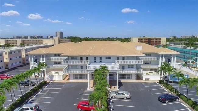 JUST LISTED, A BEACH & BOATERS LOVERS DREAM!!.. PRIVATE DEEDED BEACH ACCESS ACROSS THE STREET AND NEW BOAT DOCK TO LIVE THE LIFESYTLE OF LAUDERDALE BY THE SEA. THIS HIGHLY DEMANDED 2 BEDROOM 2 BATH UNIT FEATURES THE PERFECT LOCATION IN A WELL MANAGED AND FINANCIALLY SOUND COMPLEX WITH ALL CERTIFICATIONS COMPLETED. THE UNIT OFFERS ALOT OF UPDATES, HIGH IMPACT DOORS, WINDOWS, NEWER AC AND HOT WATER HEATER AS WELL AS A NICE SUNROOM OFFERING PLUSH BOTANICAL GARDEN & POOL VIEWS. | Image 10