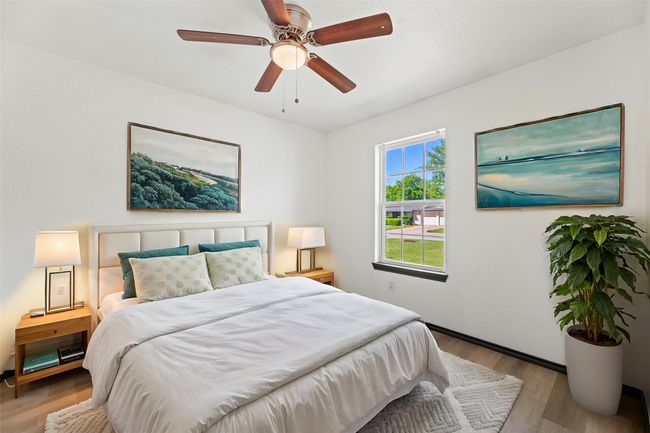 Bedroom #3 is at the front corner of the home. | Image 18