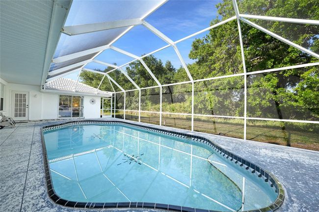 1065 Harbour Glen Pl, House other with 3 bedrooms, 2 bathrooms and null parking in PUNTA GORDA FL | Image 37