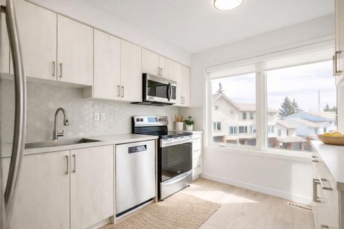 103 Coachway Lane Sw, Calgary, AB, T3H2V9 | Card Image