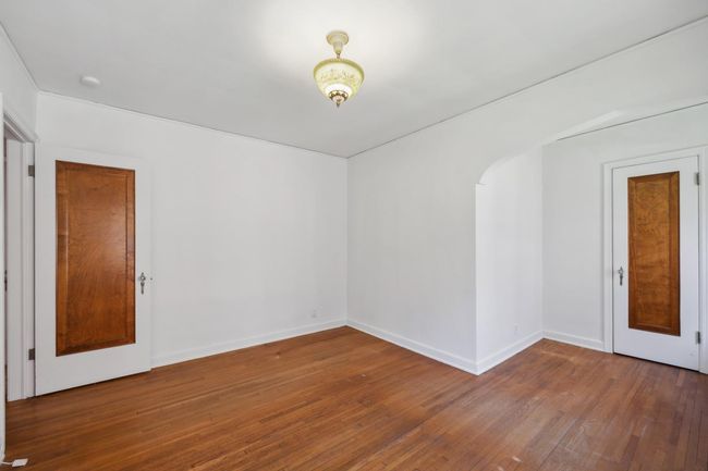 Primary bedroom has a quaint dressing nook. Great place for a cute little vanity by the closet. | Image 12