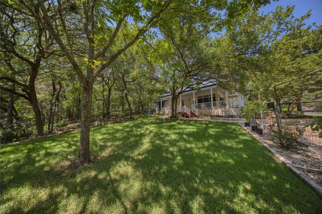 View of yard with a porch | Image 40